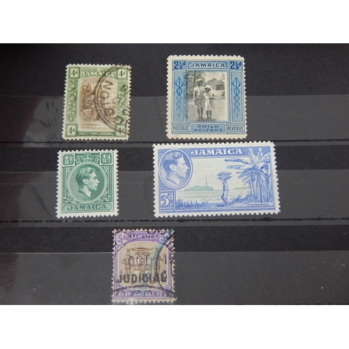 489 - Selection of Jamaican stamps. 1d scarlet block, strip of 3 1d red & ovpt Judical set.