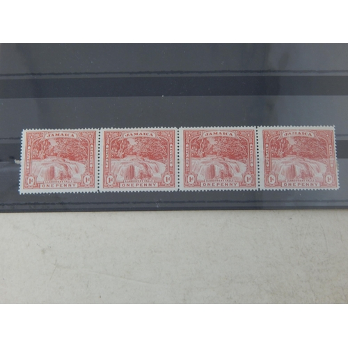 489 - Selection of Jamaican stamps. 1d scarlet block, strip of 3 1d red & ovpt Judical set.