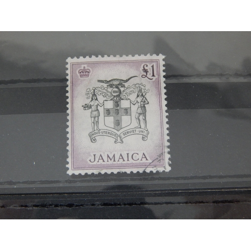 490 - A nice collection of Jamaican stamps. Mostly singles and some marginal blocks.