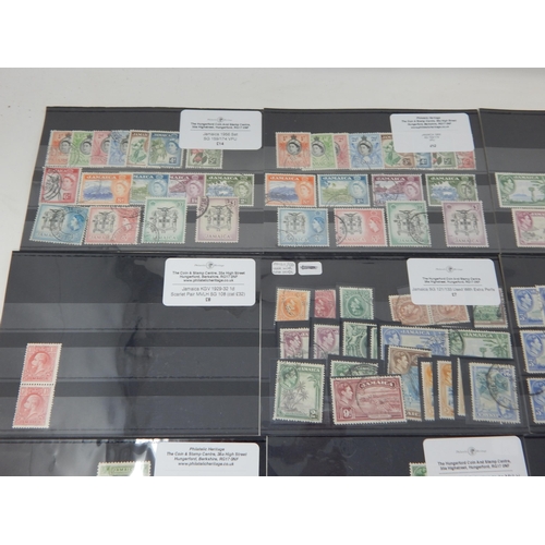 491 - Fine grouping of Jamaican stamps. All sets varying from used to Mint.