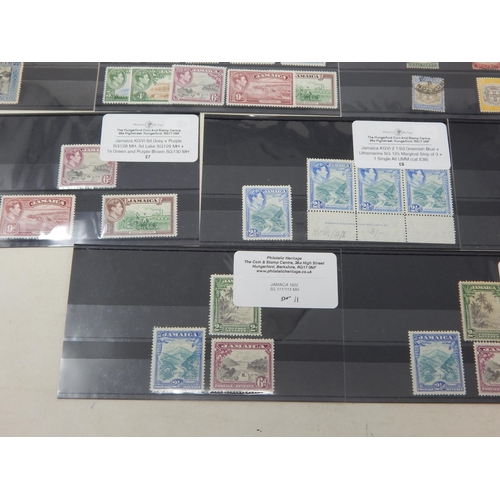 491 - Fine grouping of Jamaican stamps. All sets varying from used to Mint.