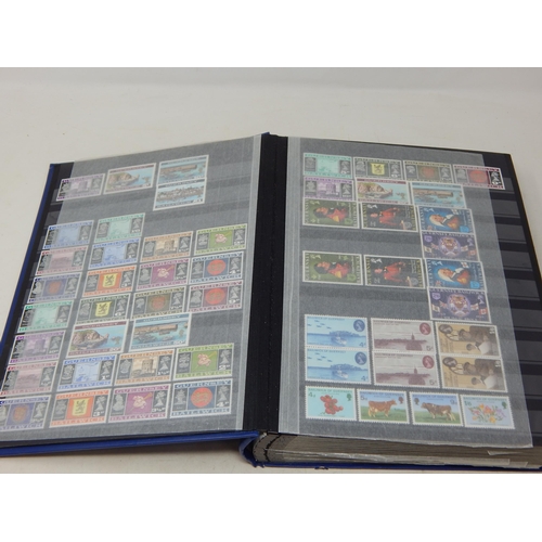 793 - A large album full of Channel Island stamps. Mainly mint.