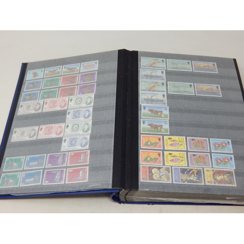 793 - A large album full of Channel Island stamps. Mainly mint.