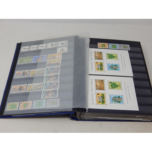 793 - A large album full of Channel Island stamps. Mainly mint.