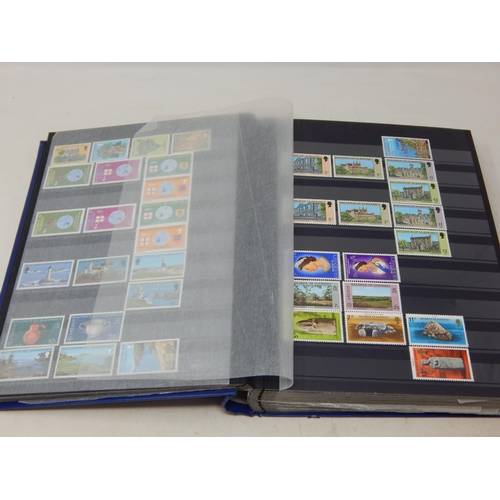 793 - A large album full of Channel Island stamps. Mainly mint.