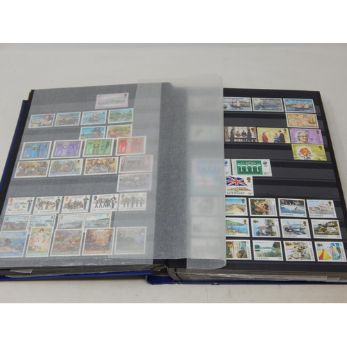 793 - A large album full of Channel Island stamps. Mainly mint.