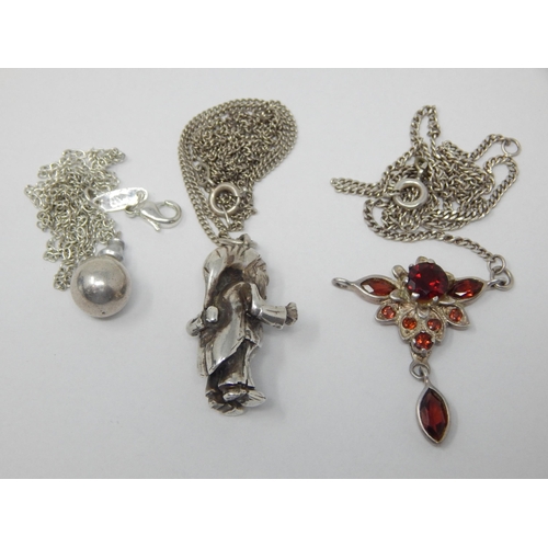 Cast Silver Pendant in the form of a Gnome on Silver Chain together with a further Silver Pendant Necklace etc.