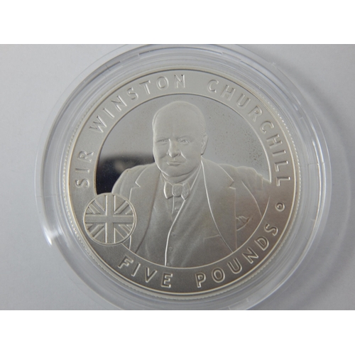 104 - Winston Churchill Silver Proof Commemorative £5 Coin together with a Churchill London Games 2012 £5 ... 