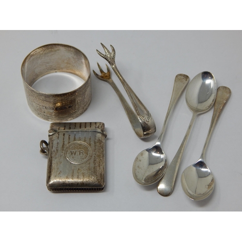 A Quantity of Hallmarked Silver Including a Vesta Case, Napkin Ring, Claw Tongs & Spoons: Various Dates & Makers.