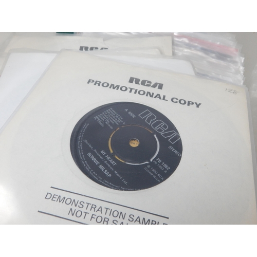 582 - A collection of 100 single 45rpm records all records are housed in plastic protective sleeves from t... 