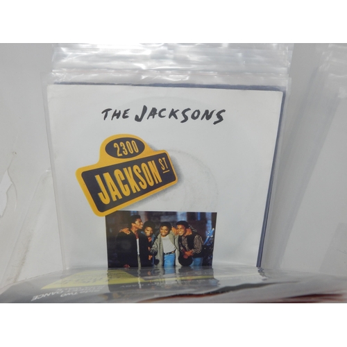 583 - A collection of 100 single 45rpm records all housed in plastic protective sleeves from the estate of... 