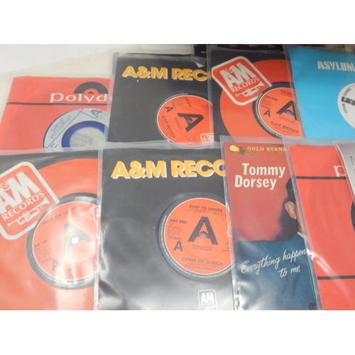 583 - A collection of 100 single 45rpm records all housed in plastic protective sleeves from the estate of... 