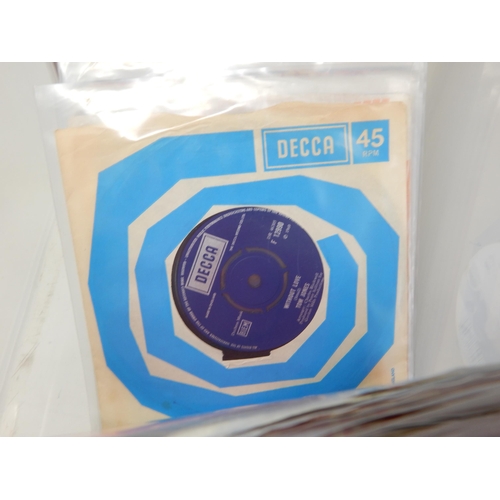 584 - A collection of 100 single 45rpm records all housed in protective plastic sleeves from the estate of... 