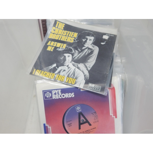 584 - A collection of 100 single 45rpm records all housed in protective plastic sleeves from the estate of... 