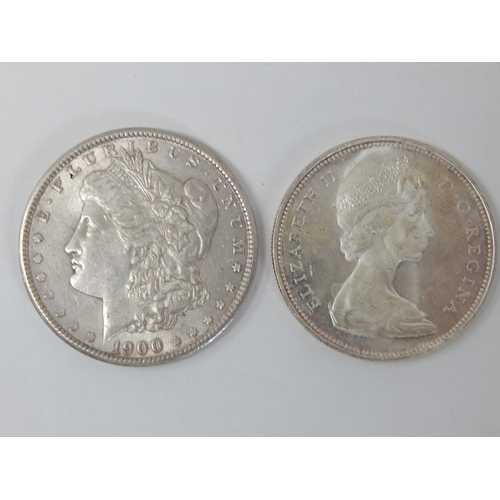 99C - U.S Silver Dollar 1900 together with a Silver Canadian Dollar 1966.