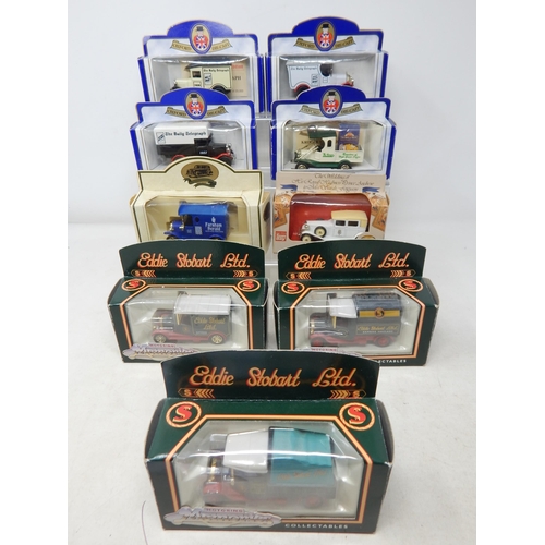 595 - A Collection of Boxed Vintage Vehicles (9)