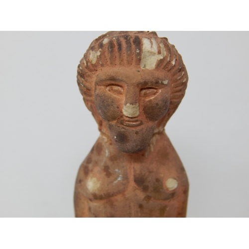 555 - Egyptian Terracotta Tomb Figure 14cm high together with an Egyptian Terracotta Oil Lamp.