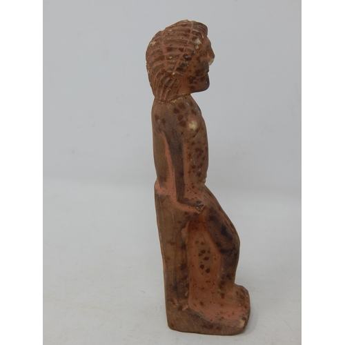 555 - Egyptian Terracotta Tomb Figure 14cm high together with an Egyptian Terracotta Oil Lamp.