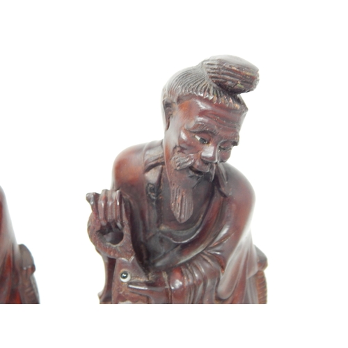 461 - Pair of Chinese Hardwood Figures of Fishermen: Height 20.5cm