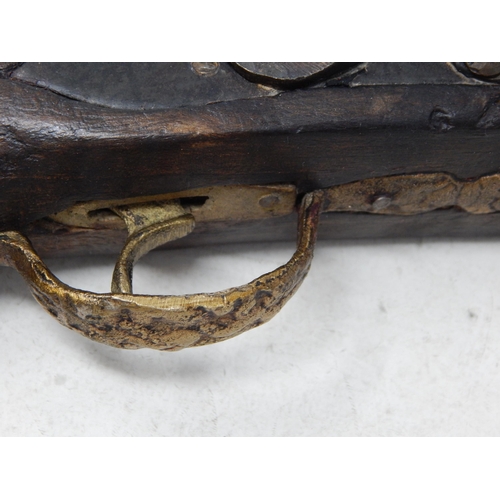 435 - Eastern Gun with Wooden Stock Inlaid with Mother of Pearl: 40cm long