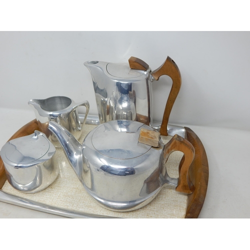 553 - 1950's Picquot Ware Tea Set Comprising: Tray, Teapot, Hot Water Pot, Milk Jug & Lidded Sugar Bowl.