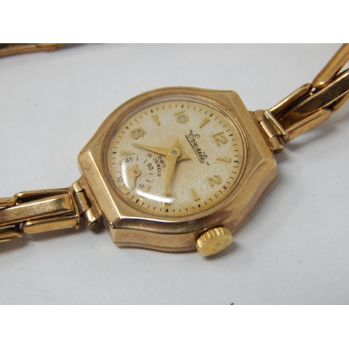 49 - Ladies 9ct Gold wristwatch by Everite on 9ct Gold expanding bracelet with metal core. gross weight 1... 