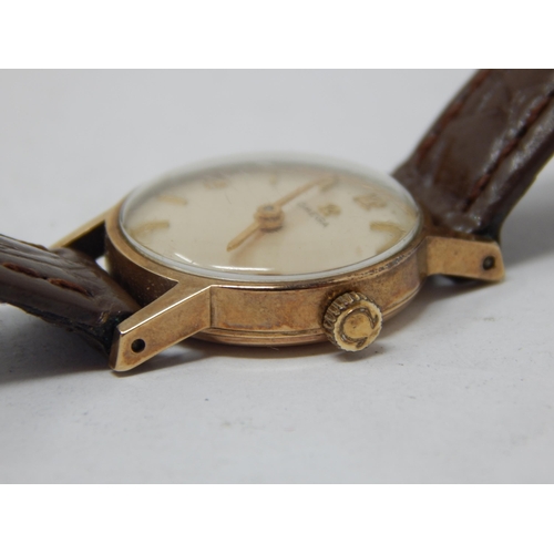 51 - Ladies 9ct Gold Omega wristwatch on leather strap