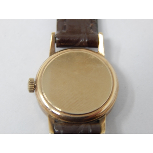 51 - Ladies 9ct Gold Omega wristwatch on leather strap