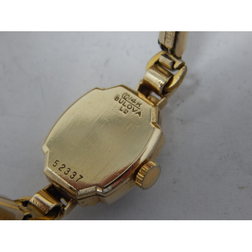 18 - Two Ladies' 14ct Gold Bulova wristwatches