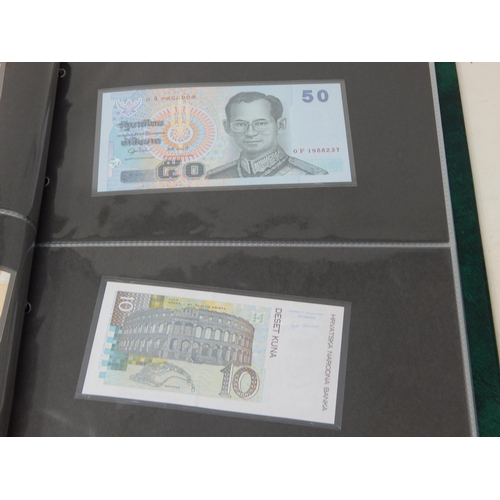 15 - A large collection of Banknotes of the World all crisp Uncirculated housed in collectors album