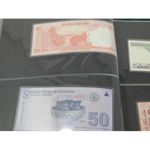 15 - A large collection of Banknotes of the World all crisp Uncirculated housed in collectors album