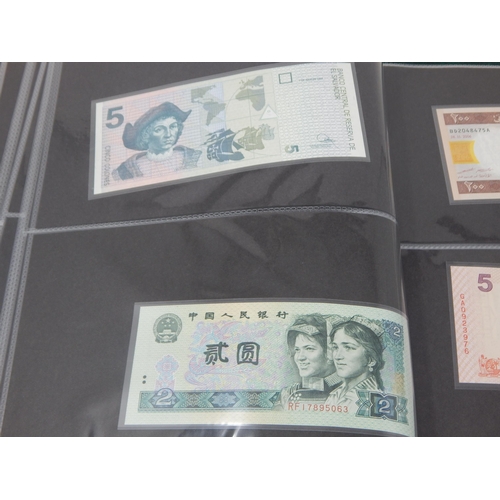 15 - A large collection of Banknotes of the World all crisp Uncirculated housed in collectors album