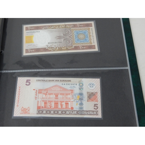 15 - A large collection of Banknotes of the World all crisp Uncirculated housed in collectors album