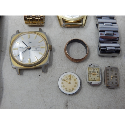 33 - A large selection of wristwatches, pocket watches, etc