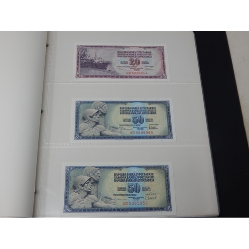 3 - Substantial collection of GB and World banknotes housed in 2 x Collector's albums