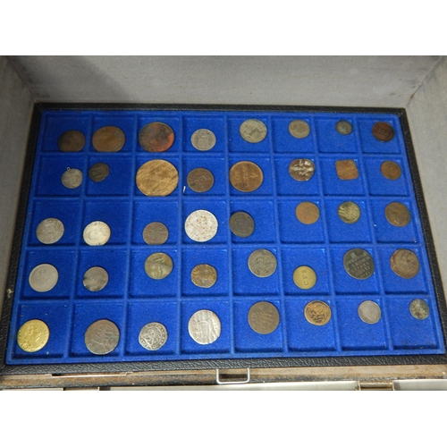 30 - A vintage Coin Collectors case containing 7 trays of World coinage