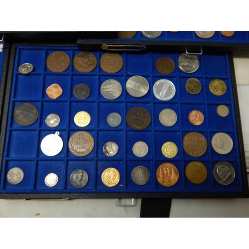 30 - A vintage Coin Collectors case containing 7 trays of World coinage