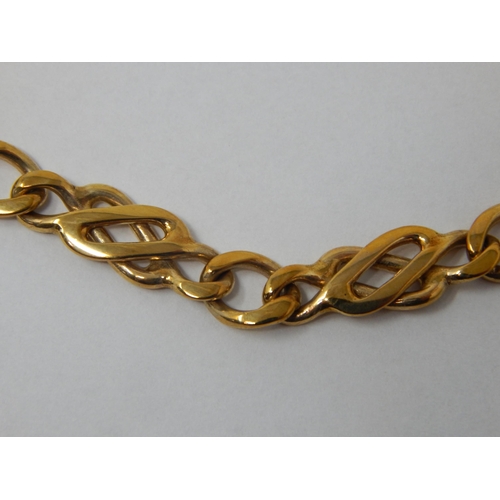 101 - 9ct Yellow Gold Celtic Link Bracelet by Charles Hart: Length 19cm: Weight 11.6g