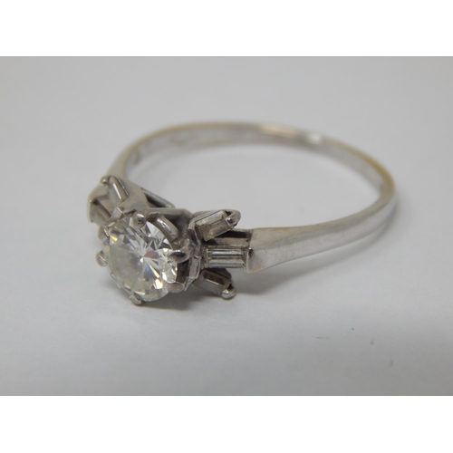 104 - Art Deco 18ct White Gold Ring Set with a Central Diamond Estimated @ 0.75cts Flanked with 6 Baguette... 