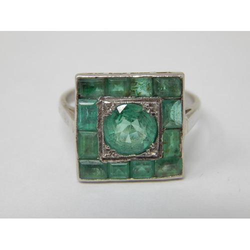 105 - Art Deco Platinum Ring Set with a Central Emerald Estimated @ 1.4cts within a border of 12 Emeralds ... 