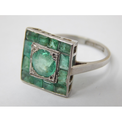 105 - Art Deco Platinum Ring Set with a Central Emerald Estimated @ 1.4cts within a border of 12 Emeralds ... 