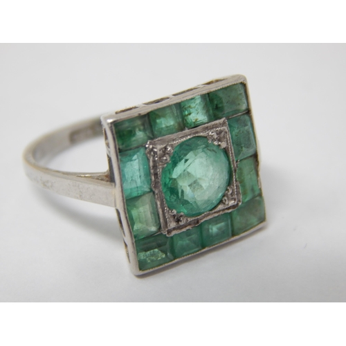 105 - Art Deco Platinum Ring Set with a Central Emerald Estimated @ 1.4cts within a border of 12 Emeralds ... 