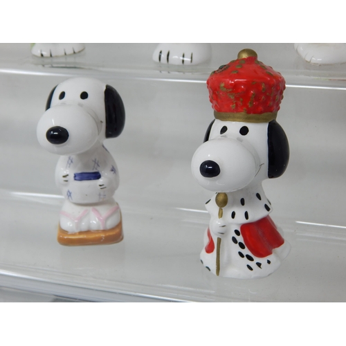 277 - Five Ceramic Snoopy Figures with Underside Labels 