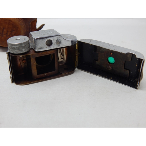 279 - A Miniature Spy Camera by HIT in Leather Case