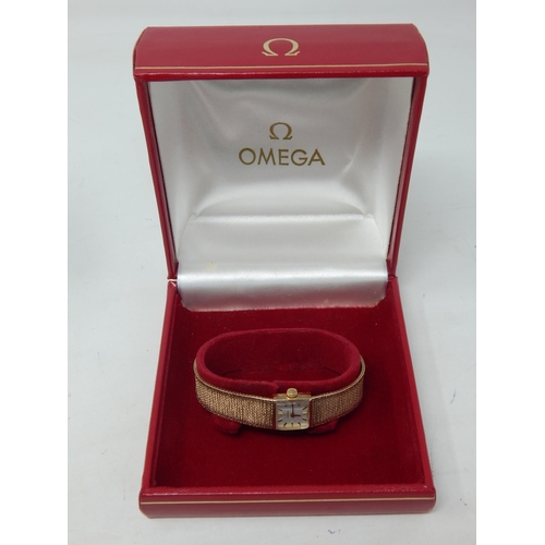 OMEGA: Ladies 9ct Yellow Gold Wristwatch on 9ct Yellow Gold Strap with Fold Over Clasp: Presented in Original Red Omega Case with Outer Box: Gross weight 27.1g: Working When Catalogued.