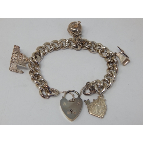 Hallmarked Silver Charm Bracelet with Attached Charms & Padlock Clasp: Weight 58.7g
