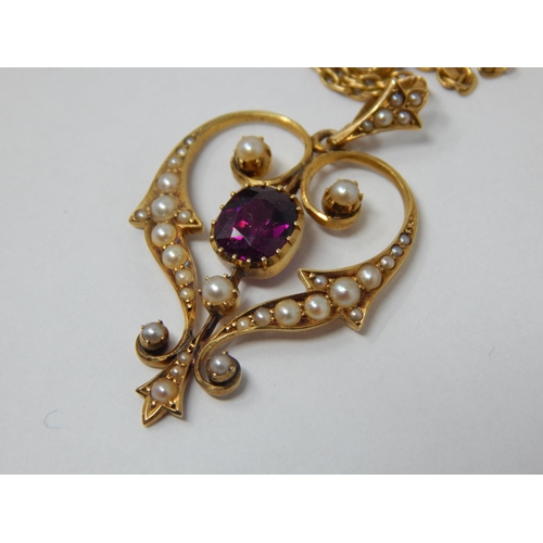 101 - Victorian 15ct Gold Heart Shaped Pendant Set with a Central Amethyst within a Seed Pearl Border on a... 