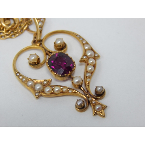 101 - Victorian 15ct Gold Heart Shaped Pendant Set with a Central Amethyst within a Seed Pearl Border on a... 