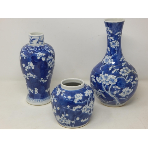 400 - Three Chinese Kangxi Period Blue & White Prunus Decorated Vases: Tallest 21.5cm high