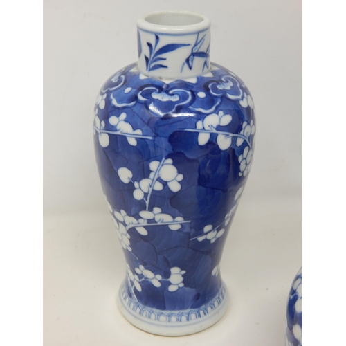 400 - Three Chinese Kangxi Period Blue & White Prunus Decorated Vases: Tallest 21.5cm high